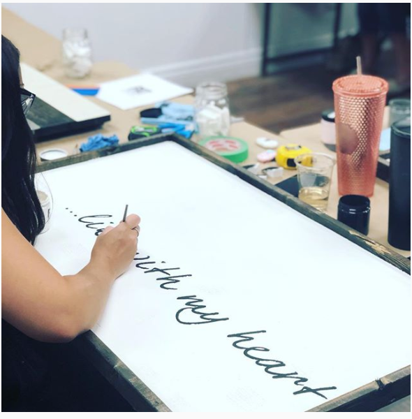 Oversized framed sign