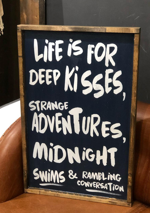 Oversized framed sign