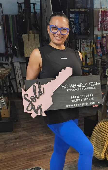 REALTORS KEY SOLD BY SIGN